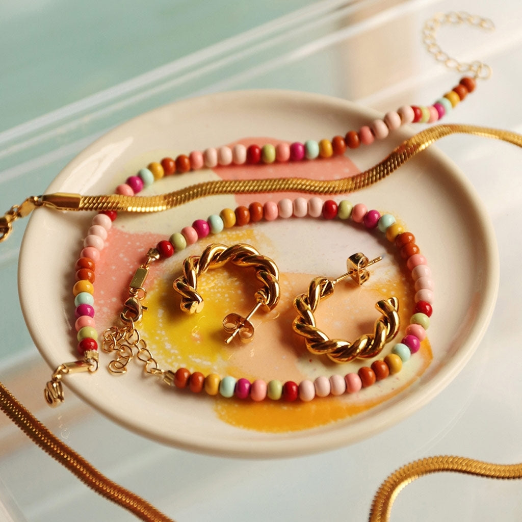 LULU Copenhagen Chunky Twisted Hoops par - guldplÀterad Hoops GuldplÀterad